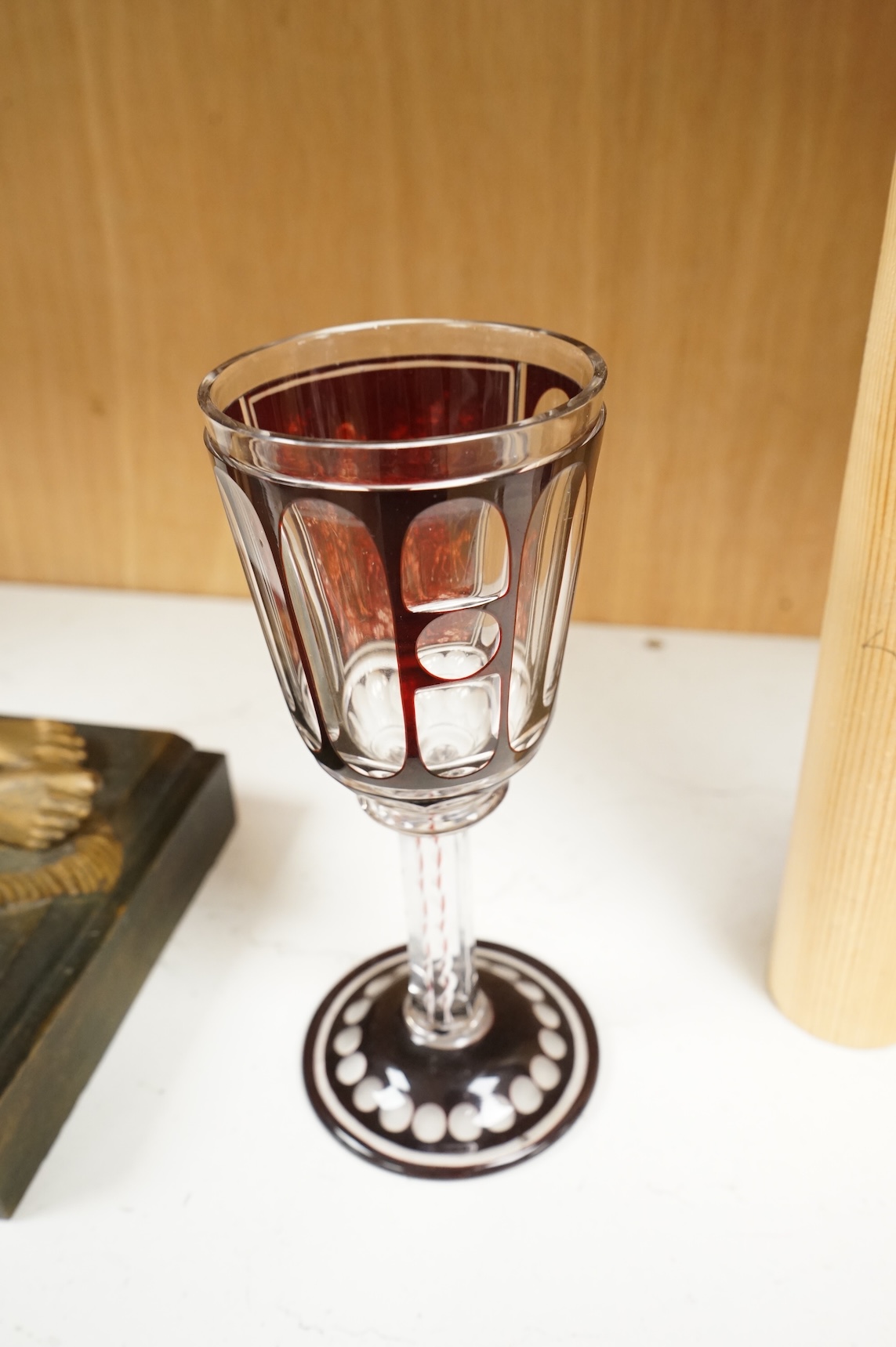 A Bohemian engraved ruby overlaid wine goblet, c.1850